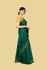 Load image into Gallery viewer, deep green golden goose saree draped side view with woven design