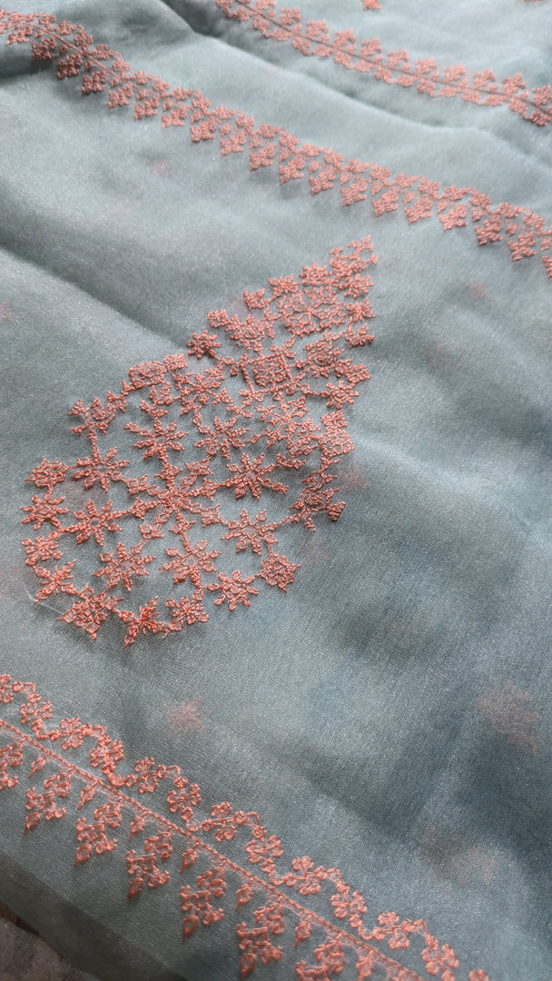 organza saree in pista shade kasuti petal embroidery border detail