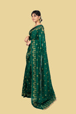 Load image into Gallery viewer, deep green golden goose saree folded view with embroidered motifs