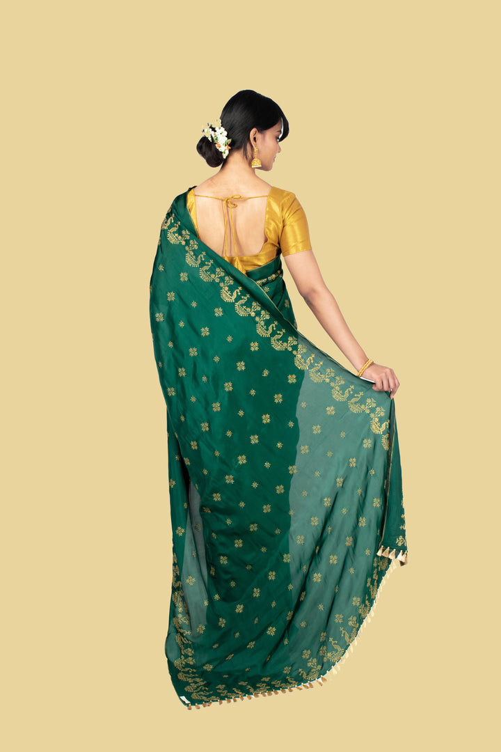 deep green golden goose saree pallu embroidery close-up