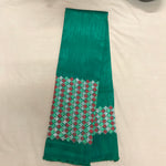 Load image into Gallery viewer, Green banjara work blouse showing embroidered banjara motifs front view
