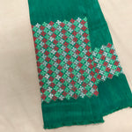 Load image into Gallery viewer, Green banjara work blouse close-up with mirror and thread embroidery

