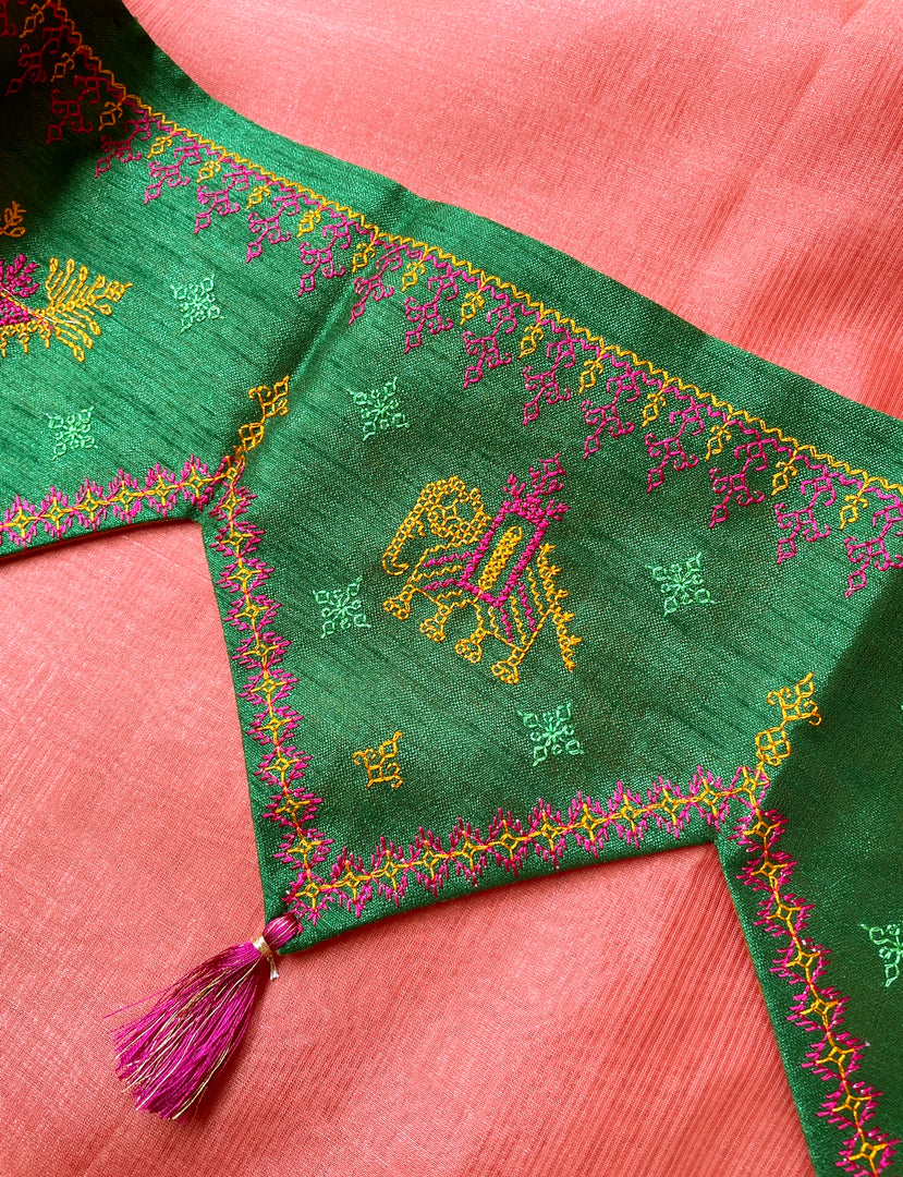 Green classic kasuti toran displayed with ornate embroidery