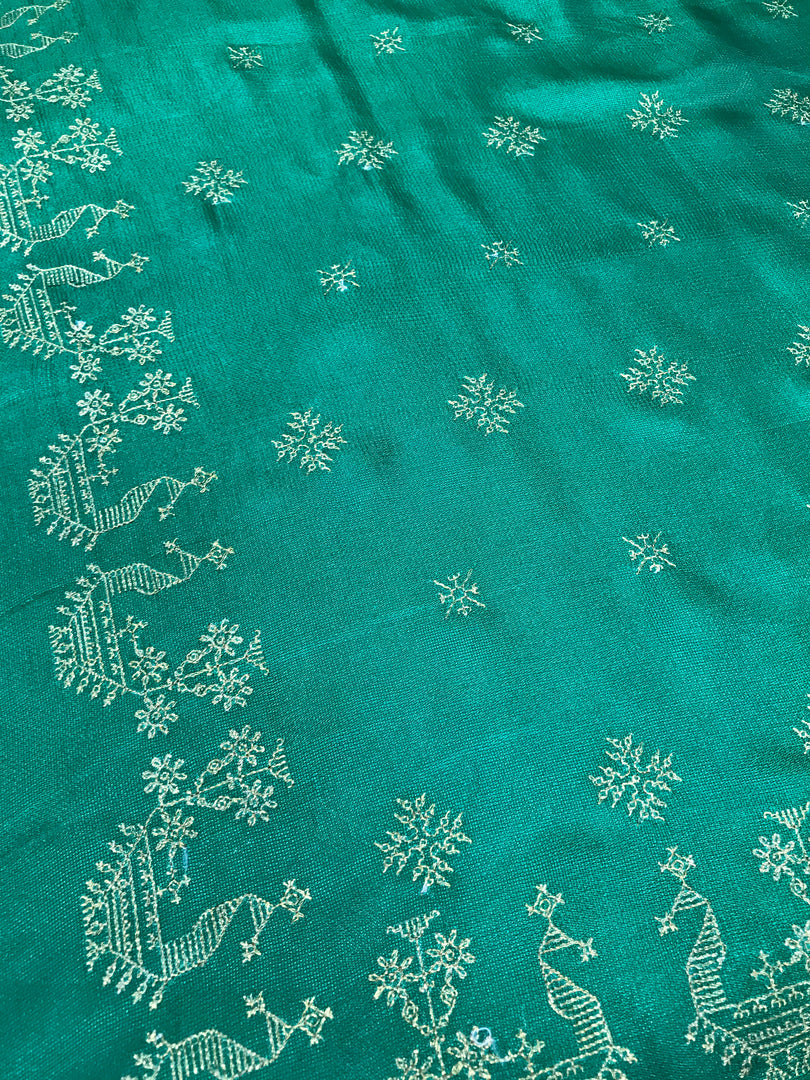 Golden goose motif embroidery close-up on green saree