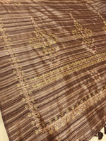 Load image into Gallery viewer, Front view of striped brown kasuti saree with motifs
