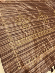 Front view of striped brown kasuti saree with motifs
