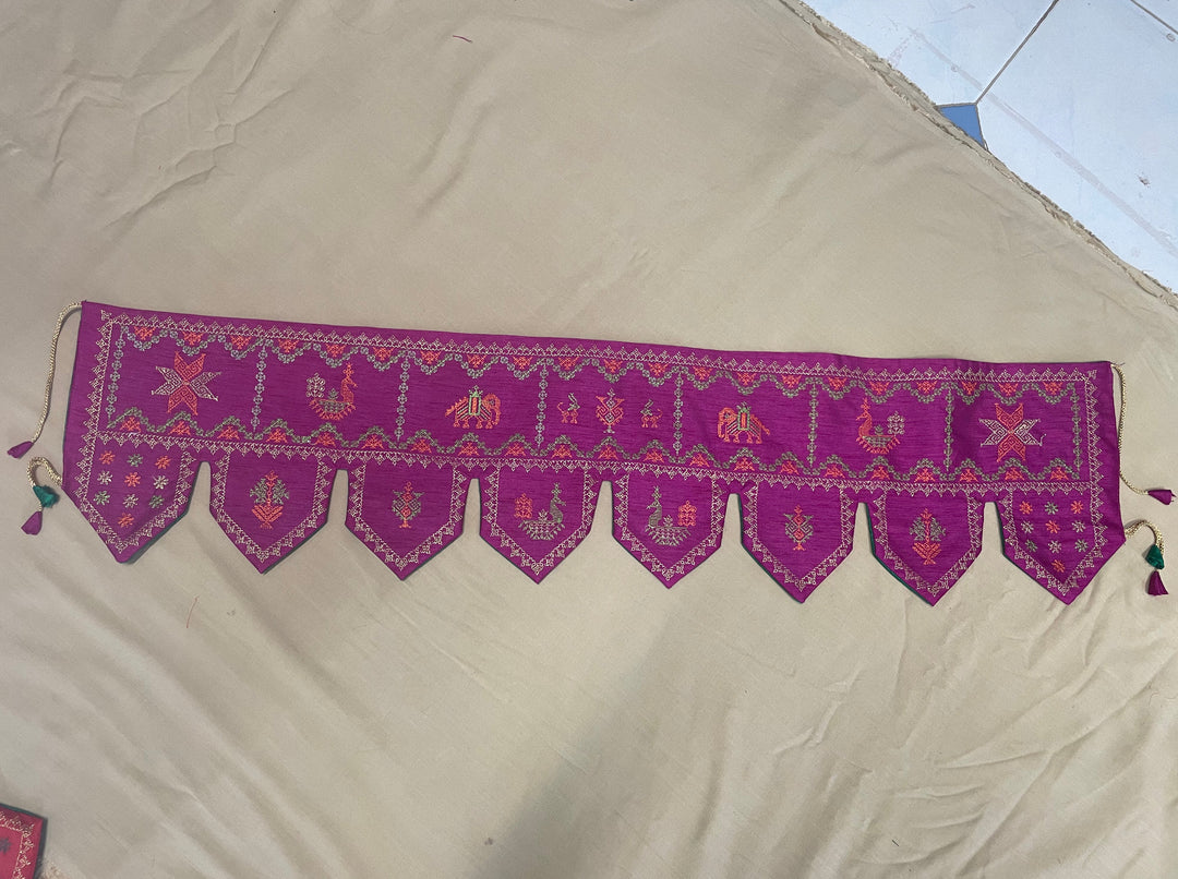 purple kubera toran with detailed center embroidery
