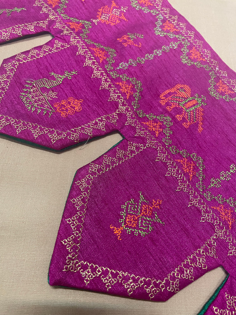 purple kubera toran with floral embroidery close-up