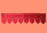 Load image into Gallery viewer, Close-up of red kubera toran showing embroidered motifs
