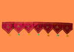 Load image into Gallery viewer, Maroon kasuti toran shown in close-up with detailed motifs
