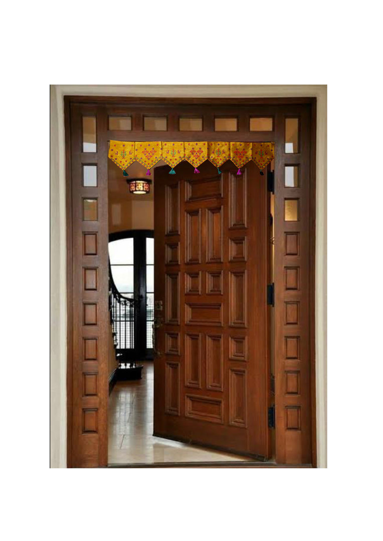Mustard classic kasuti toran displayed with hanging embroidery