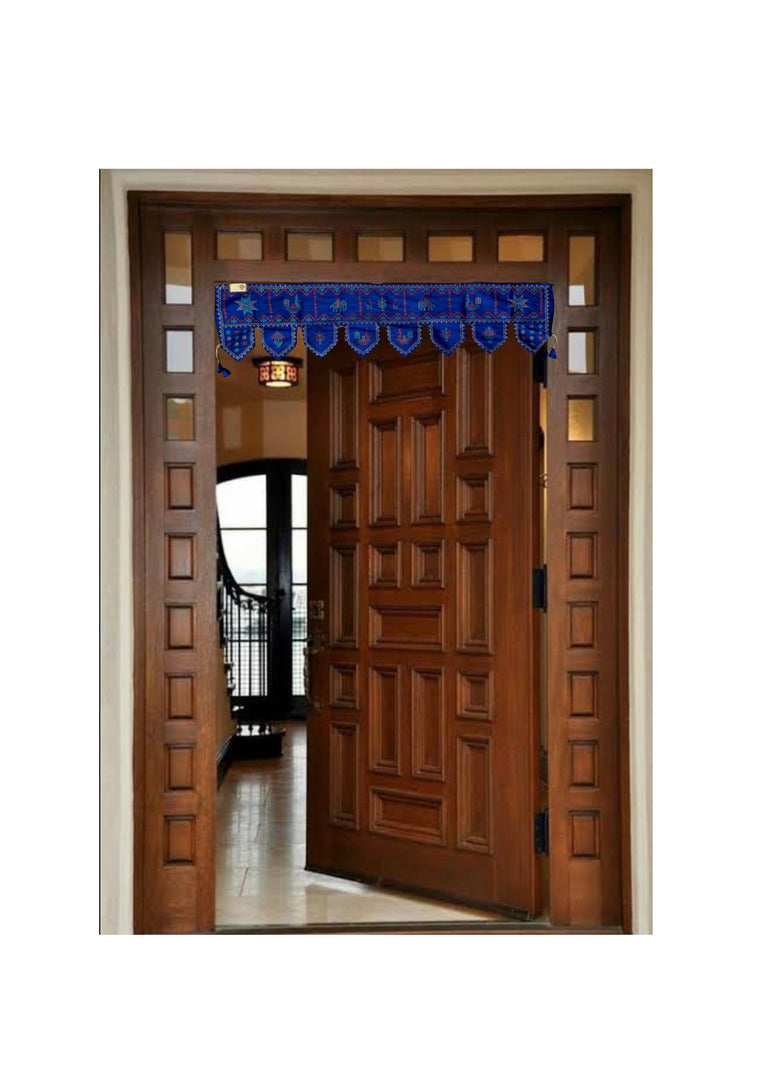 Blue kubera toran displayed with ornate embroidered hangings