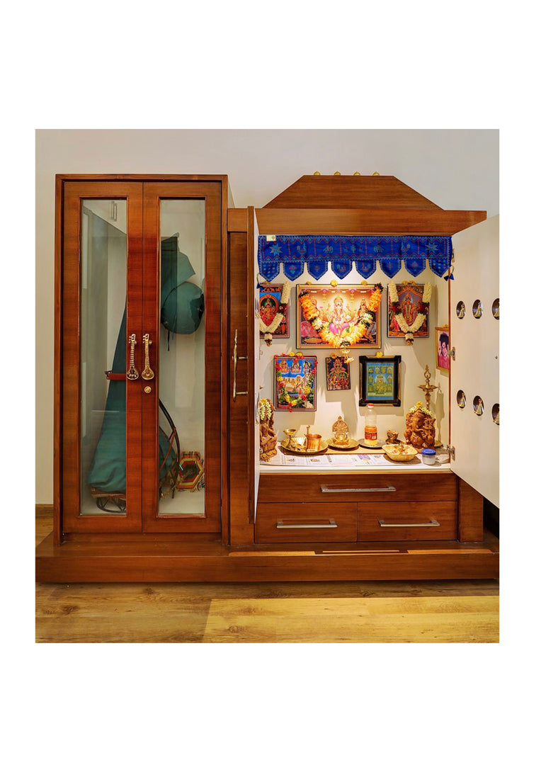 Blue kubera toran draped with threadwork and tassel details