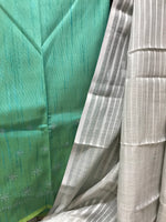 Load image into Gallery viewer, Grey lilian sonet saree close-up of woven embroidered detail
