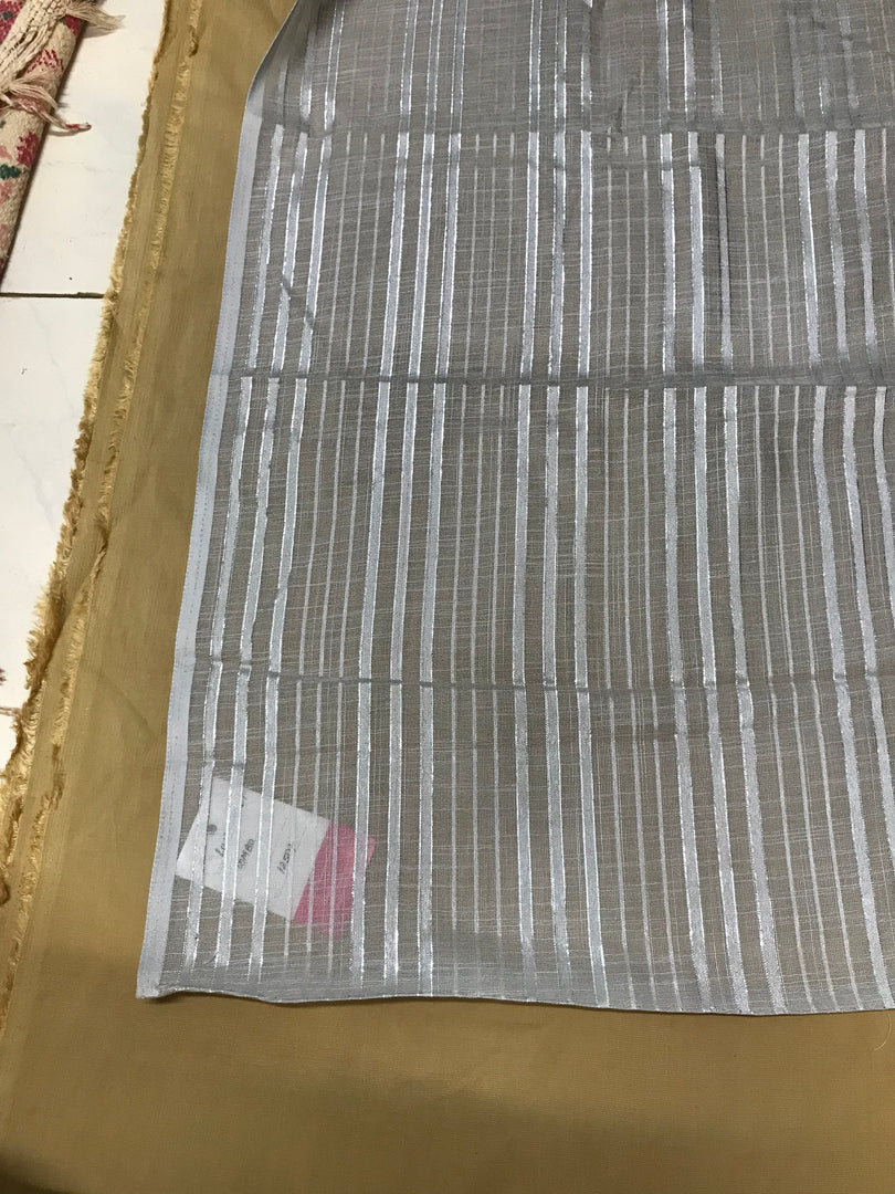 Grey lilian sonet saree pleats showing embroidered kasuti stitchwork