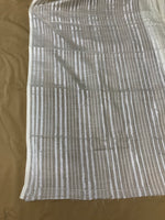 Load image into Gallery viewer, Off white lilian sonet saree full view highlighting embroidered motifs
