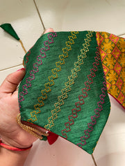 Side view of parrot green ridhi siddhi toran with hanging detail