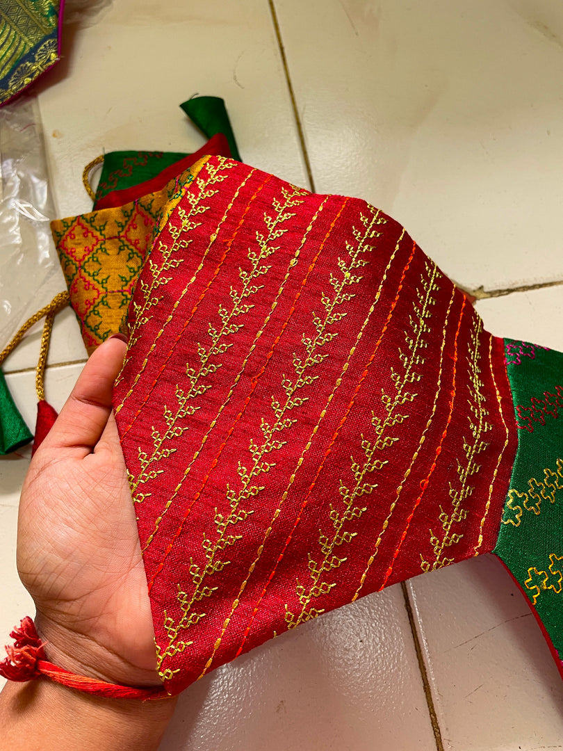 Embroidered ridhi siddhi toran in parrot green with tassel accents