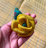 Load image into Gallery viewer, Embroidered pink rose kasuti clip close-up with floral stitch detail
