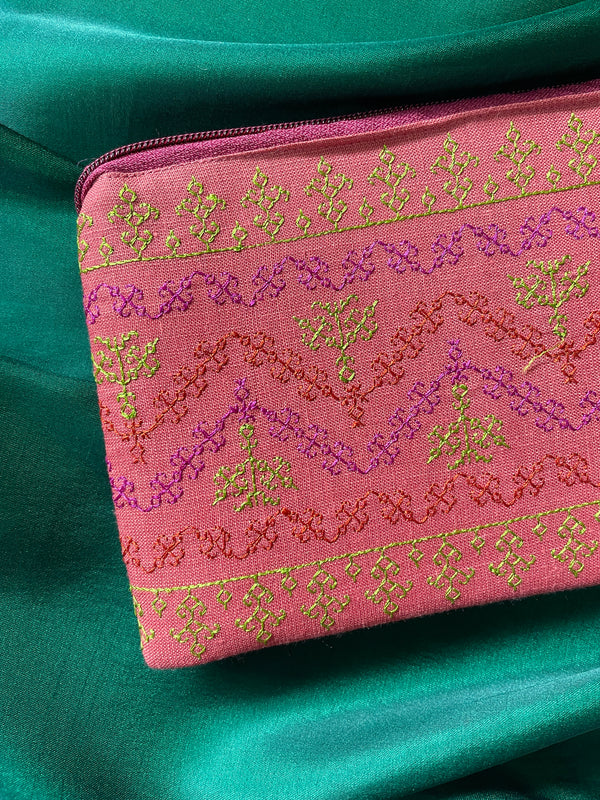 Dusty pink maharani purse front view with ornate design