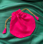 Load image into Gallery viewer, Red embroidered butti potli with floral motifs and drawstring top
