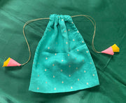 Parrot green potli with floral embroidery and beaded tassel detail