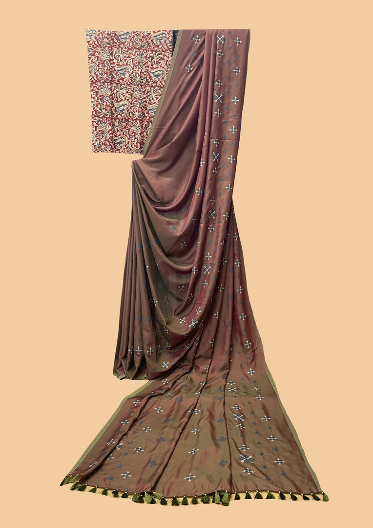 Mehendi green saree with flora butti motifs and red blockprint blouse