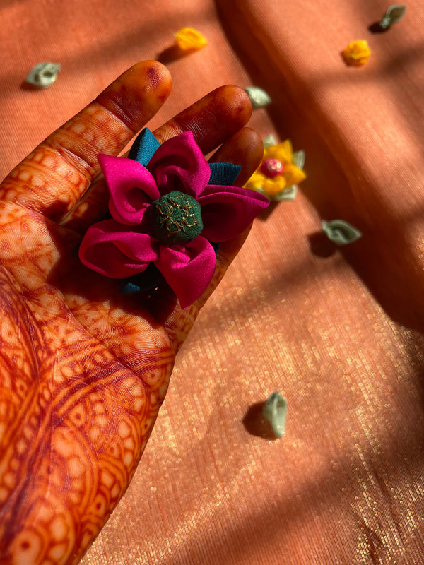 Yellow dahlia fridge magnet with layered petal detail