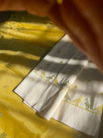 Load image into Gallery viewer, Beige kasuti organza saree close-up showing zari border and motifs
