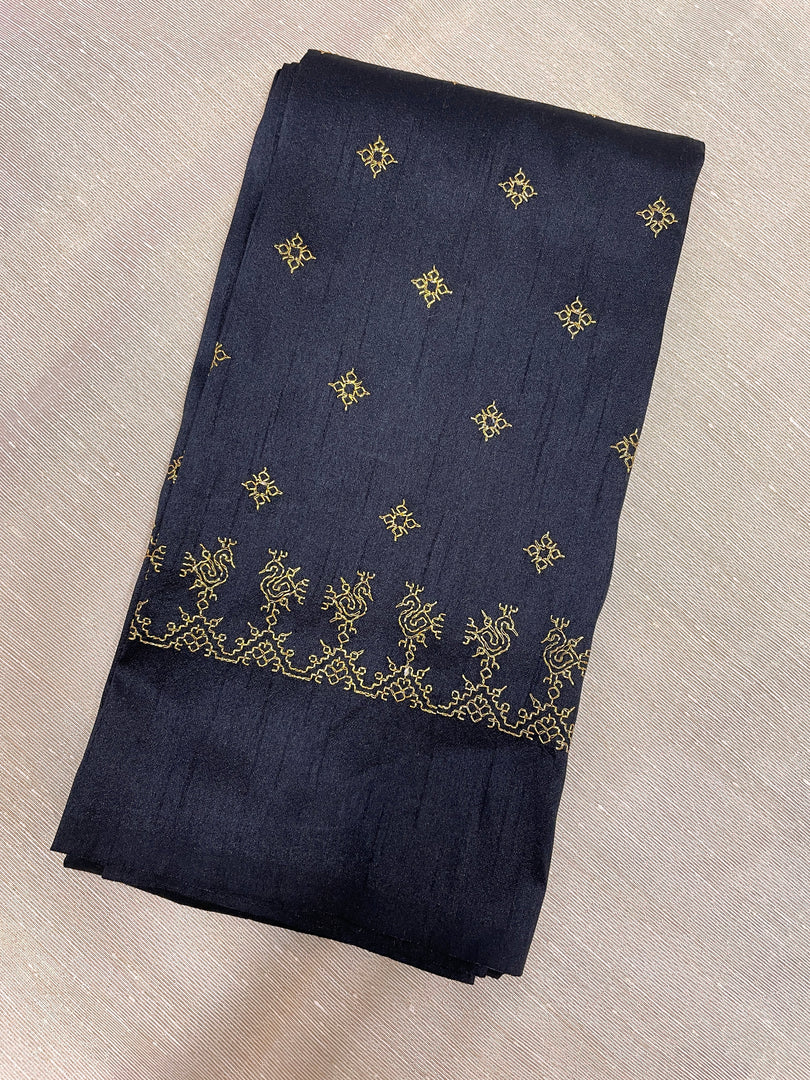 Black peacock kasuti blouse close-up showing embroidered peacock motifs