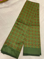 Load image into Gallery viewer, Close-up of kasuti floral embroidery on mehendi green fabric
