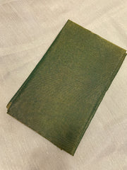 Green tissue blouse featuring subtle sheen and smooth cotton texture