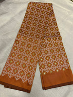 Load image into Gallery viewer, Traditional threadwork close-up on rust brown kasuti blouse

