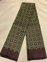 Load image into Gallery viewer, Hand embroidery close-up on coffee brown kasuti blouse fabric
