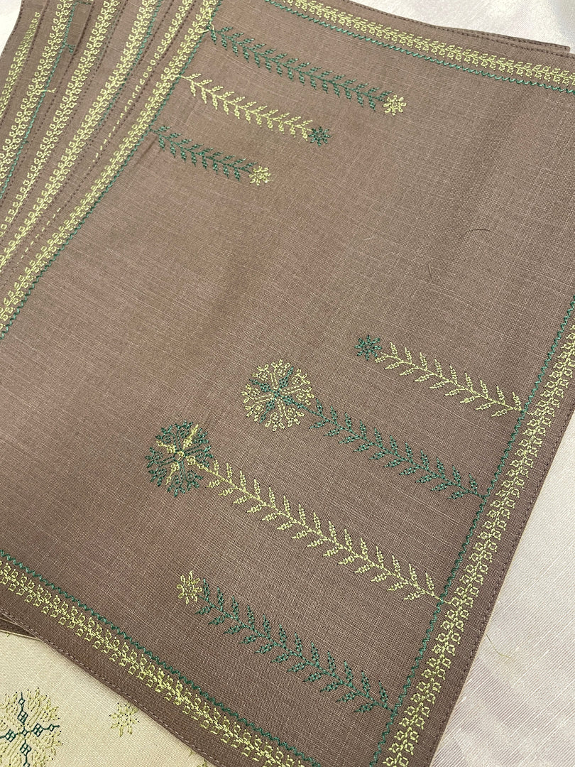 Motif detail on hampi garike kasuti table set with woven embroidery