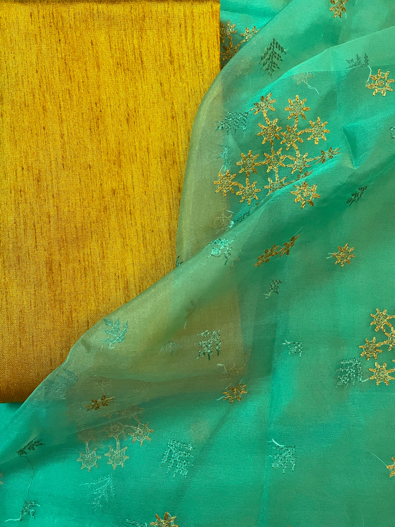 green flowers in the wind kasuti organza saree with floral embroidery