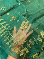 Load image into Gallery viewer, green mayur organza kasuti saree showing embroidery across fabric
