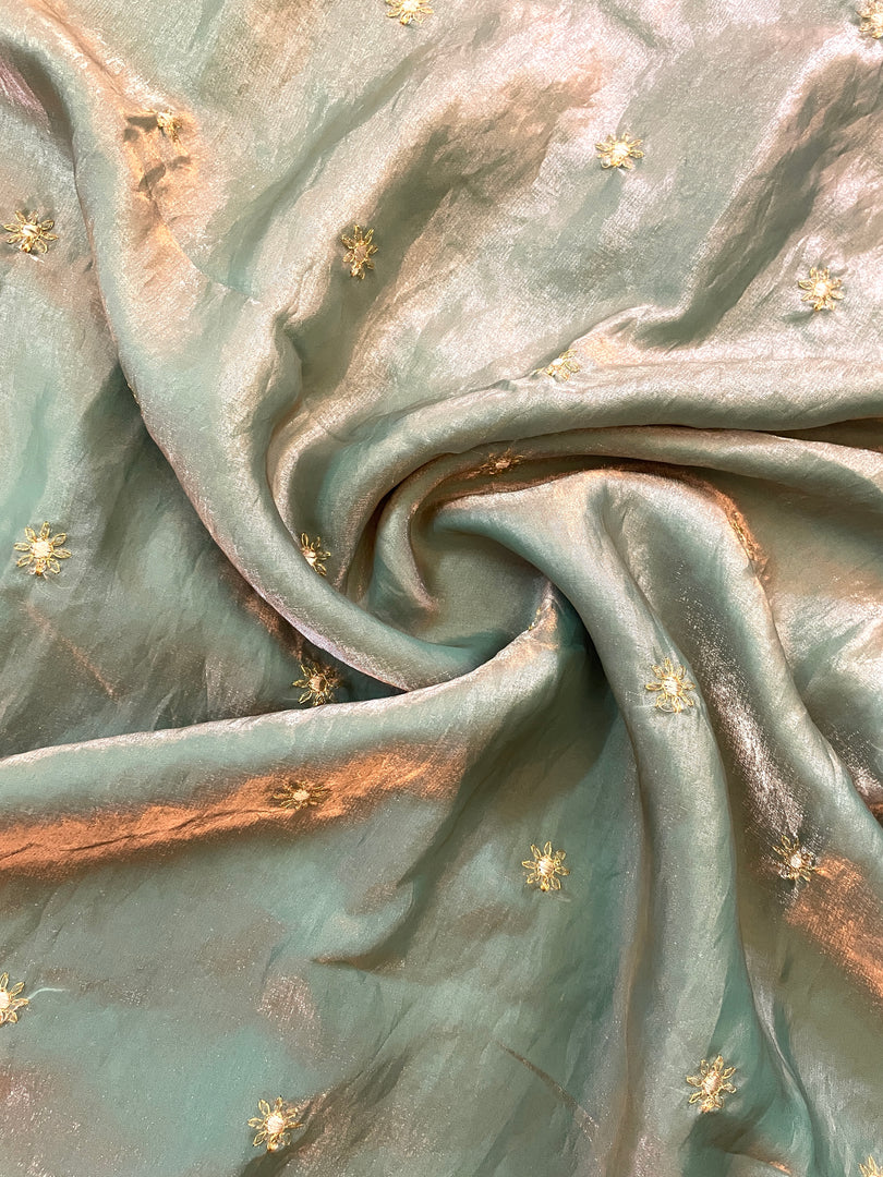 jade flora organza saree with jade green sheer fabric and floral motifs