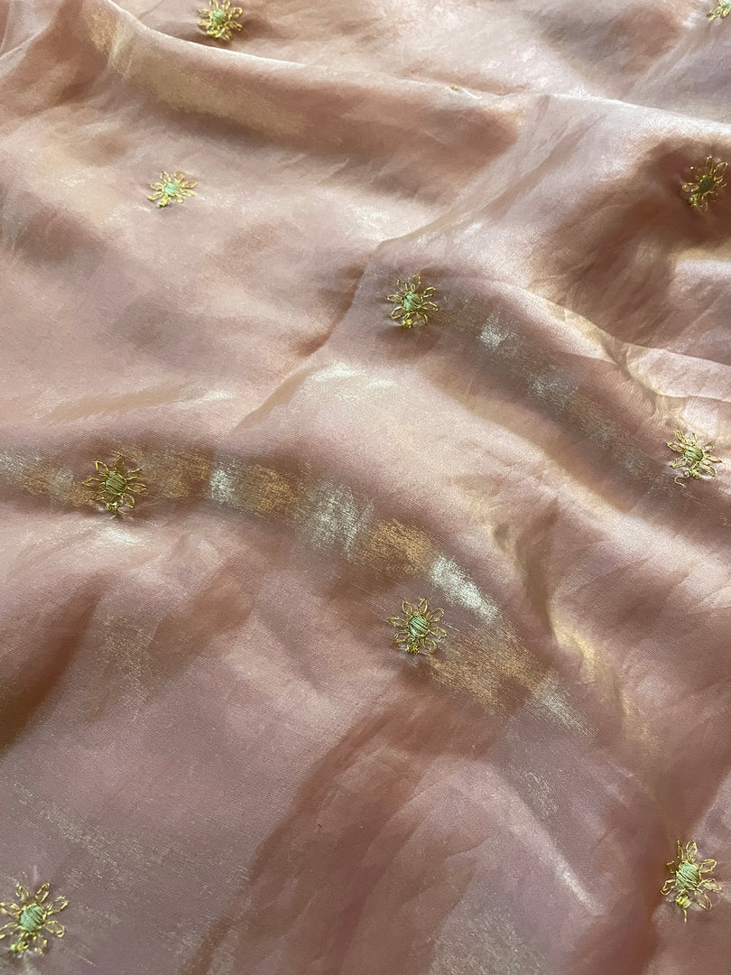 deep brick organza saree with embroidered floral pattern on drape