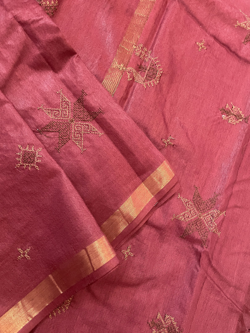 brick red kasuti ooru saree with embroidered motifs across fabric