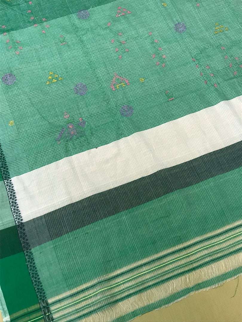 Pallu close-up of monsoon green kasuti saree with forest embroidery