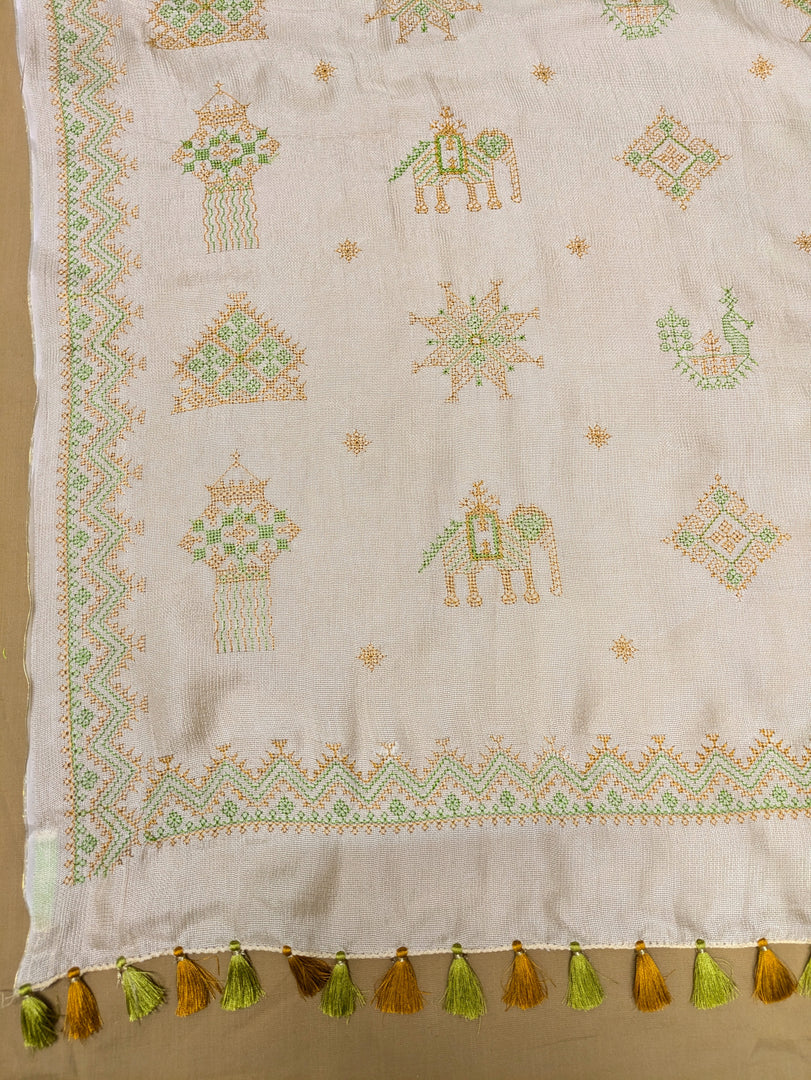 Pearl white classic kasuti saree featuring delicate embroidered motifs