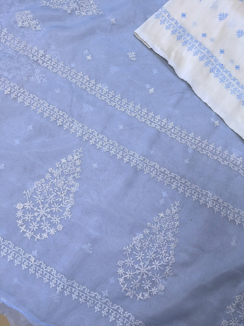 Cornflower blue organza kasuti saree featuring embroidered floral border