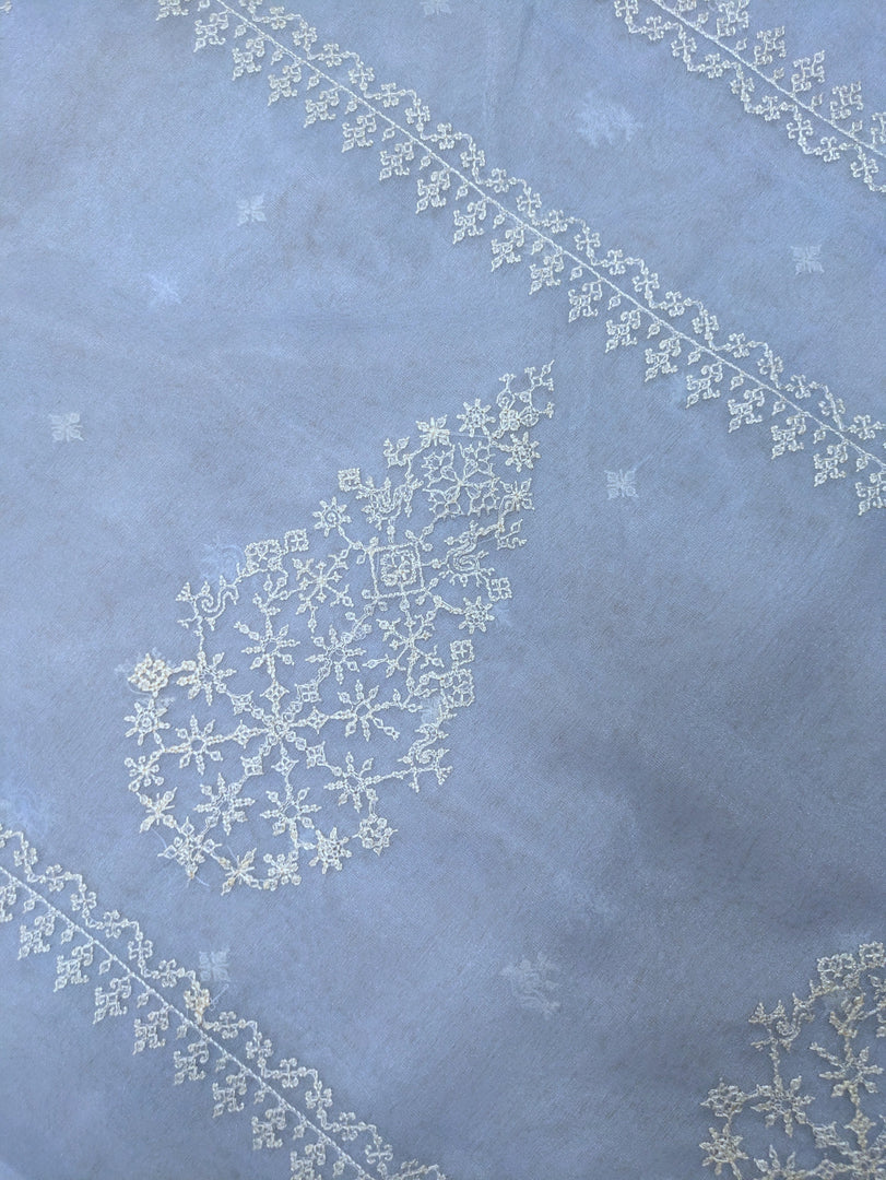 Cornflower blue kasuti saree in organza fabric with petal design close-up