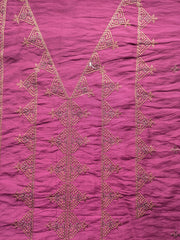 Deep pink kasuti kurti showcasing side embroidery detail