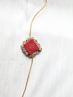 Load image into Gallery viewer, Red kasuti rakhi with intricate hand embroidery design

