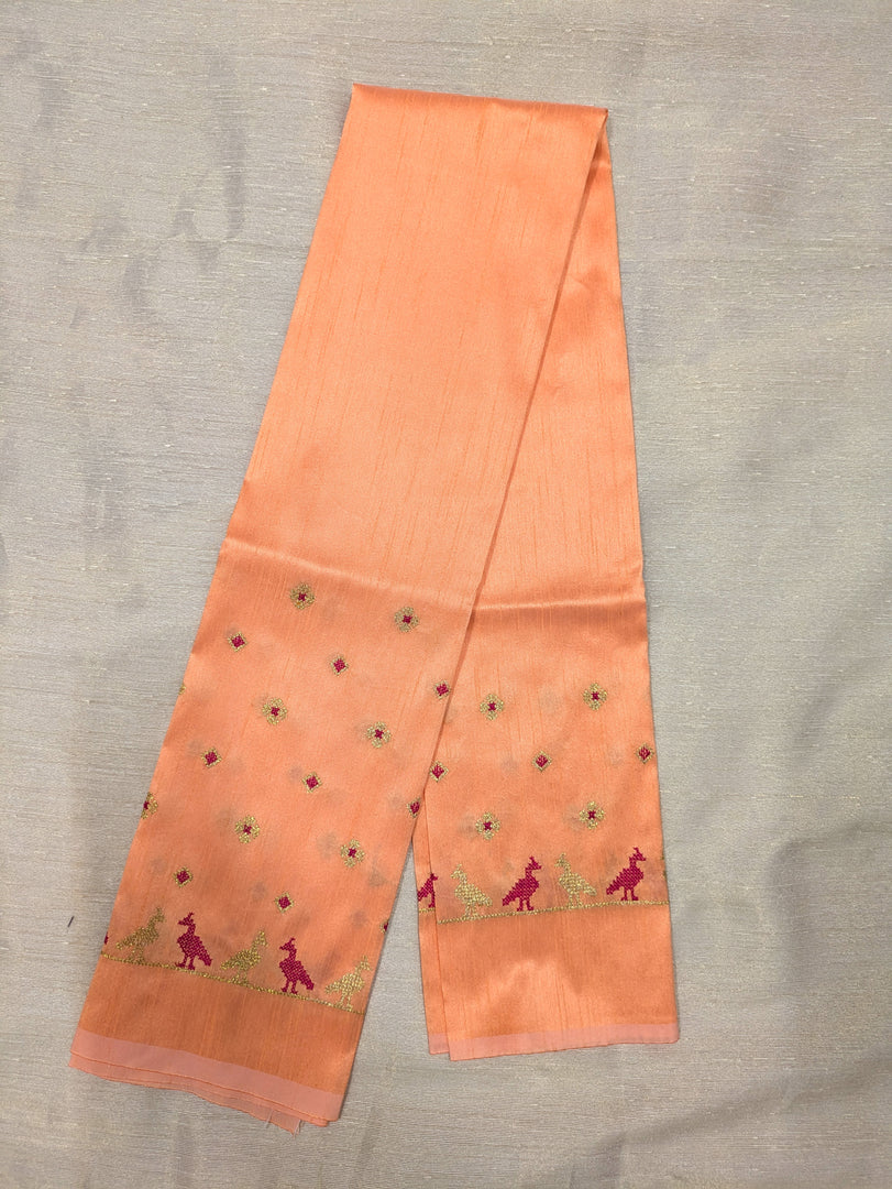 Peach mayur blouse with embroidered peacock motif close-up