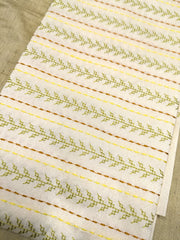 White and mehendi kasuti blouse with embroidered neckline