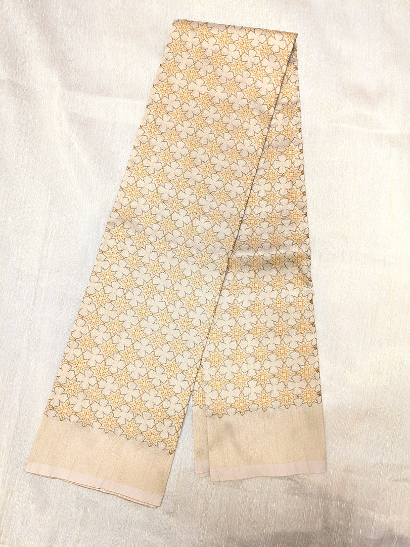 Front close-up of cream antara kasuti blouse showing embroidered motifs