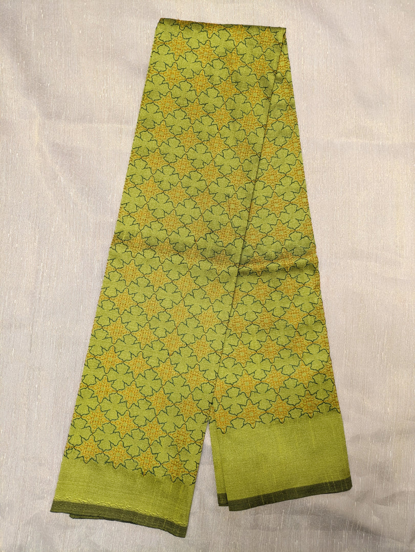 Back detail of green antara kasuti blouse with floral kasuti embroidery